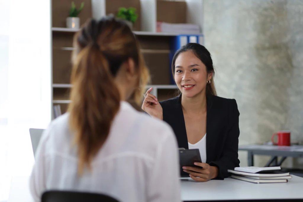 Visa specialist assisting a client with appointment booking